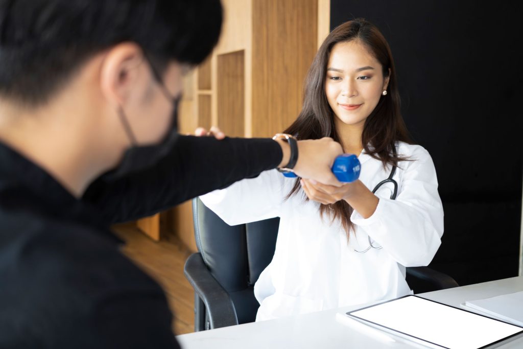 Doctor doing physical exam to a patient.