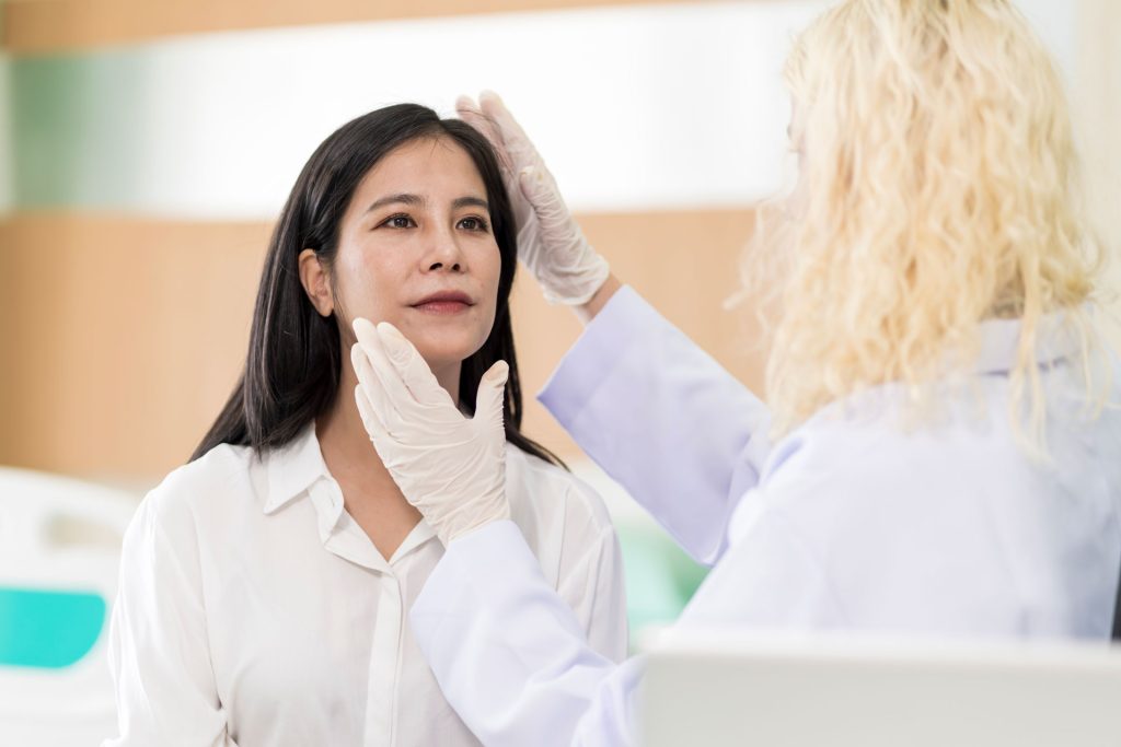 Woman consulting with a doctor.