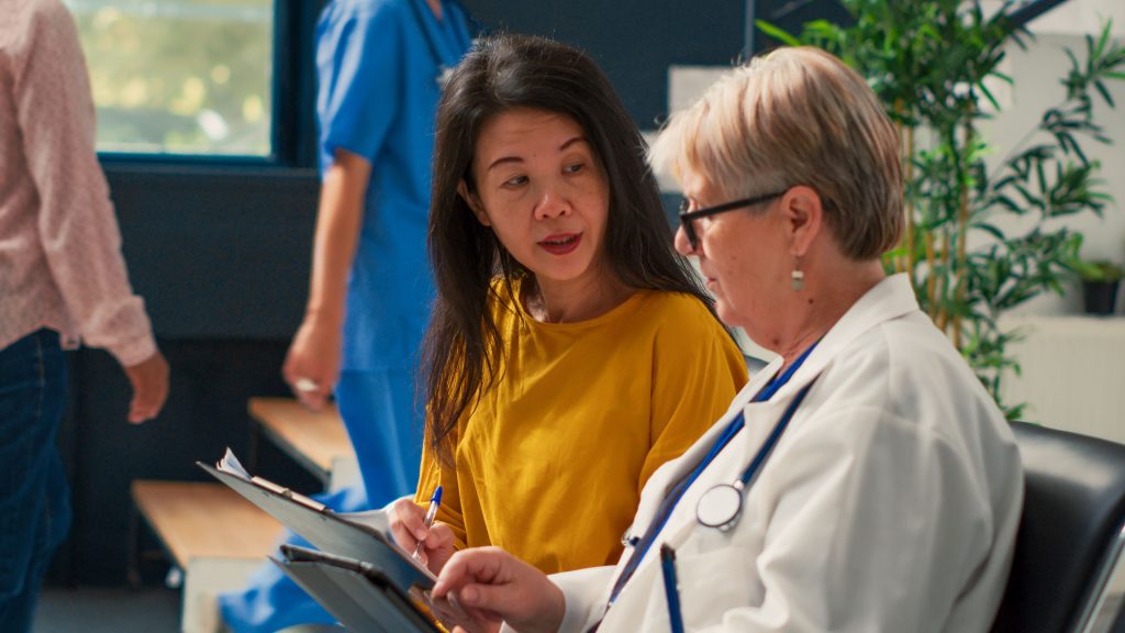Doctor and patient talking about acute care.