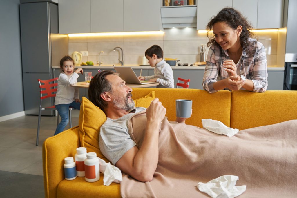 Family taking care of sick father.