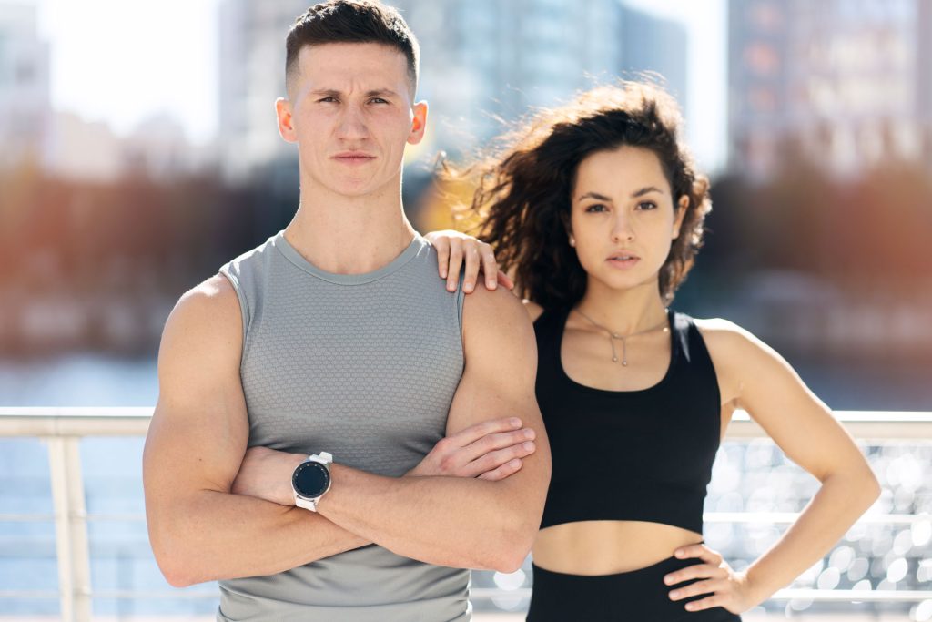 Portrait of a man and woman after fitness.