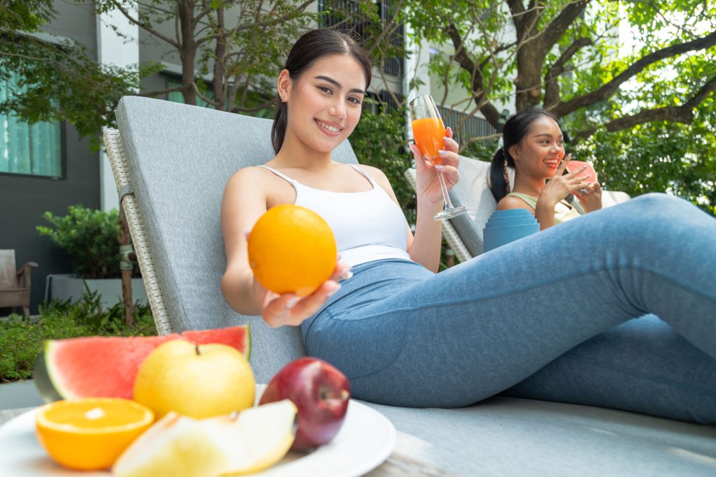 Female friends drinking fruit juices.