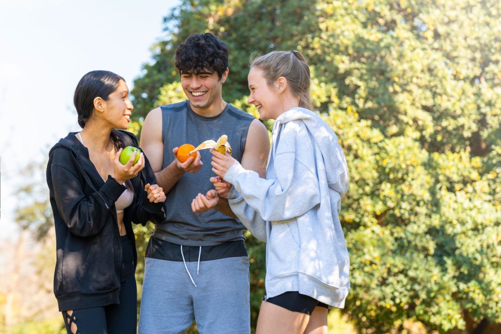 Young people doing sports taking a break.