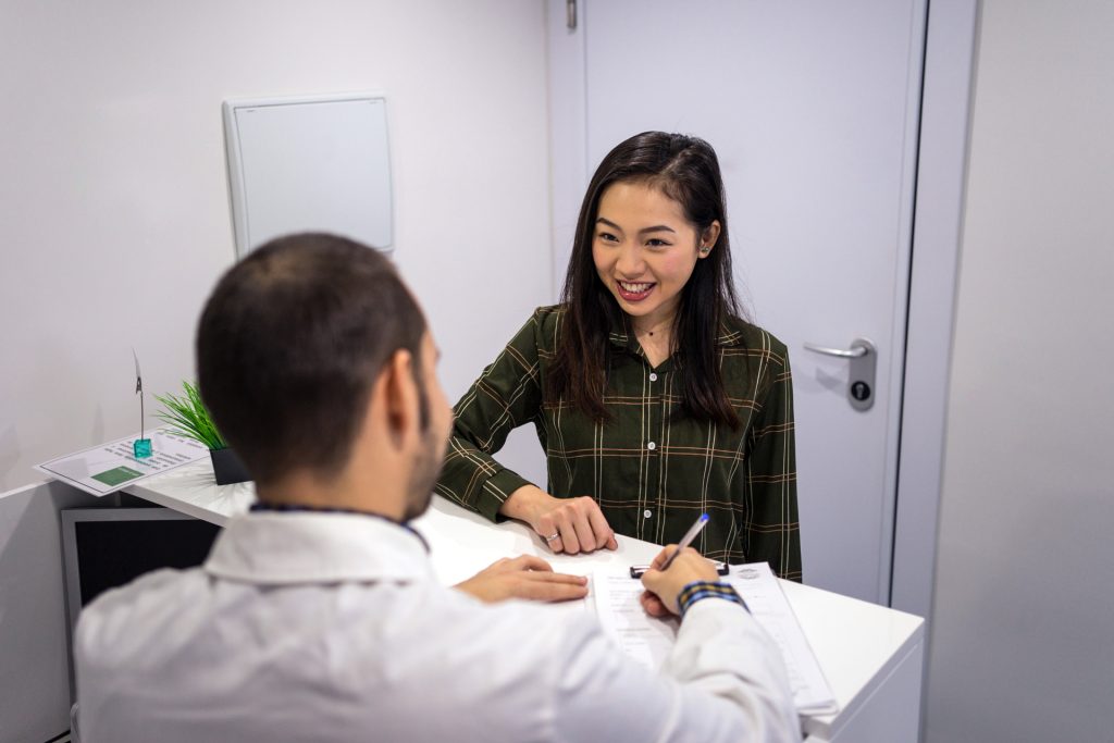 Doctor talking to patient.