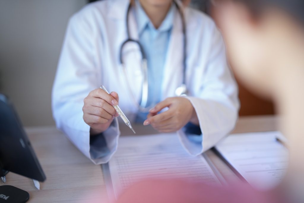 Doctor doing additional tests.