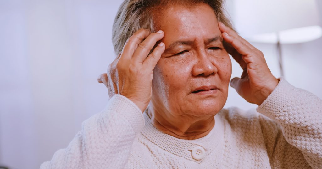 Elderly man with headache.