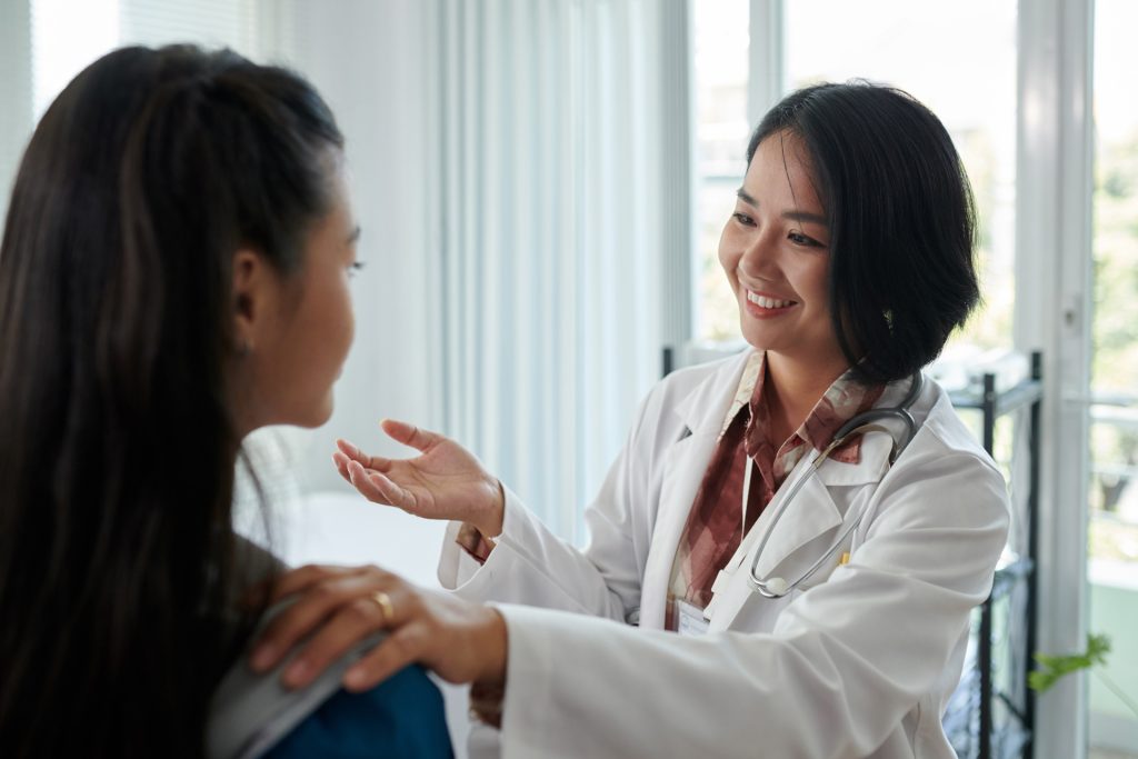 Doctor talking to patient.