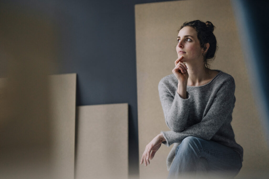 Woman ponders.