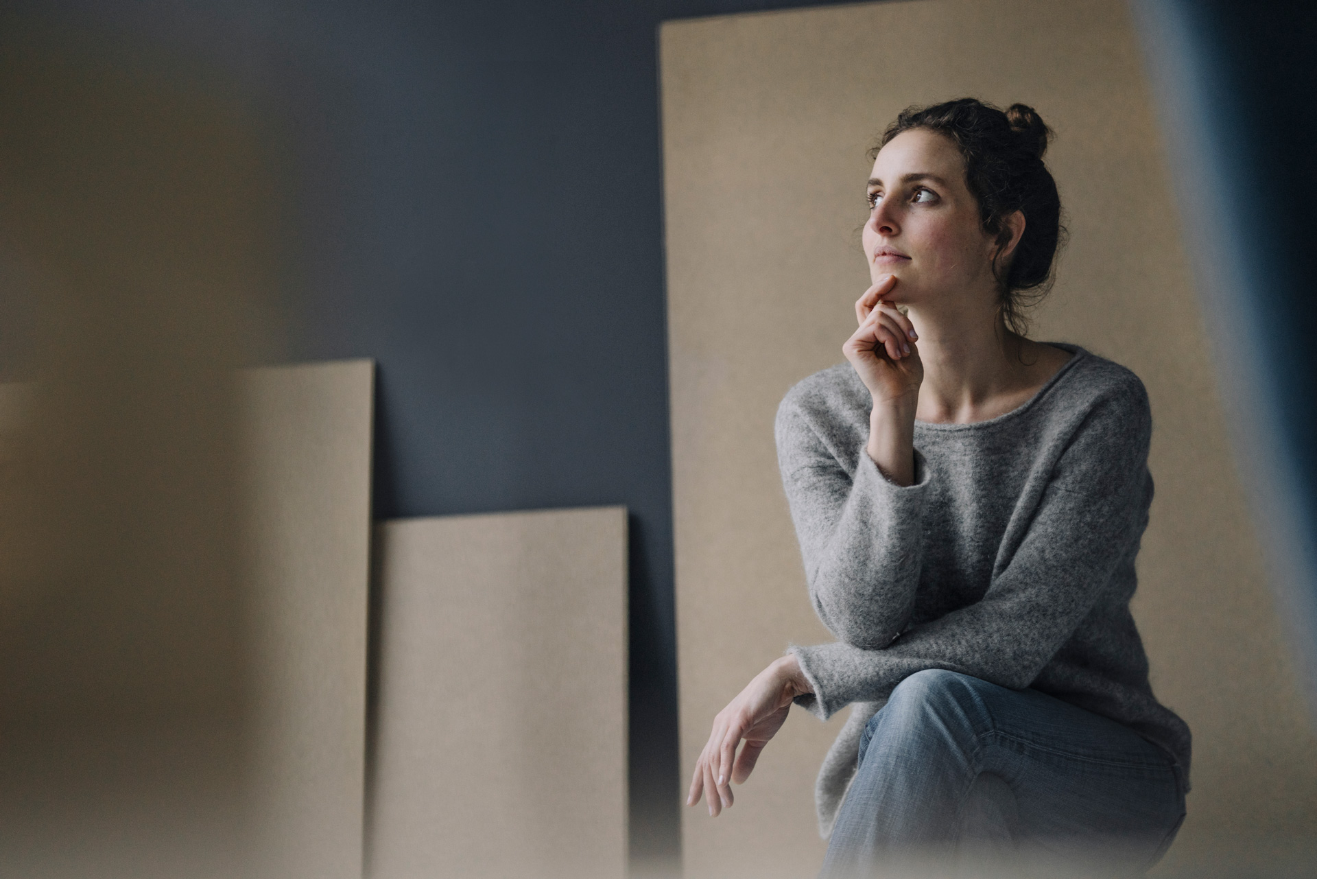 Woman ponders.
